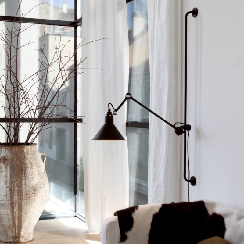Opn&aring; et industrielt look i dit hjem med en sort v&aelig;glampe fra Lampe Gras
